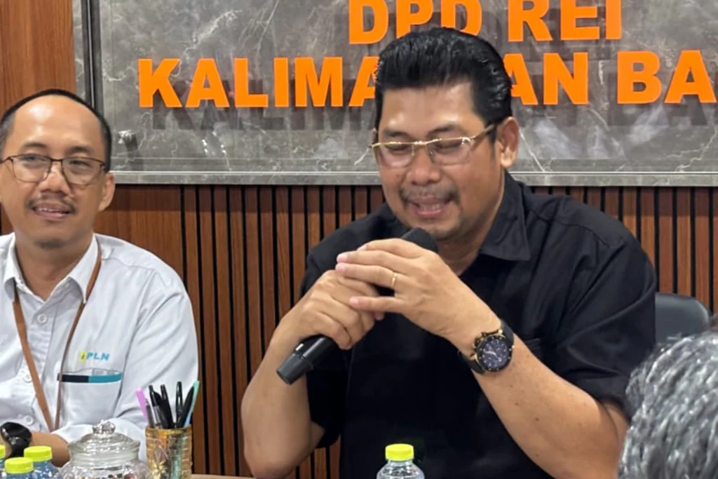 Ketua REI Kalbar menyampaikan pernyataan terkait kpr subsidi slik dalam kegiatan resmi
