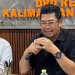 Ketua REI Kalbar menyampaikan pernyataan terkait kpr subsidi slik dalam kegiatan resmi
